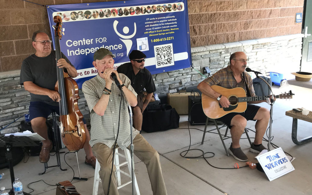 4 musicians perform for CFI at the Highline Lake shelter.